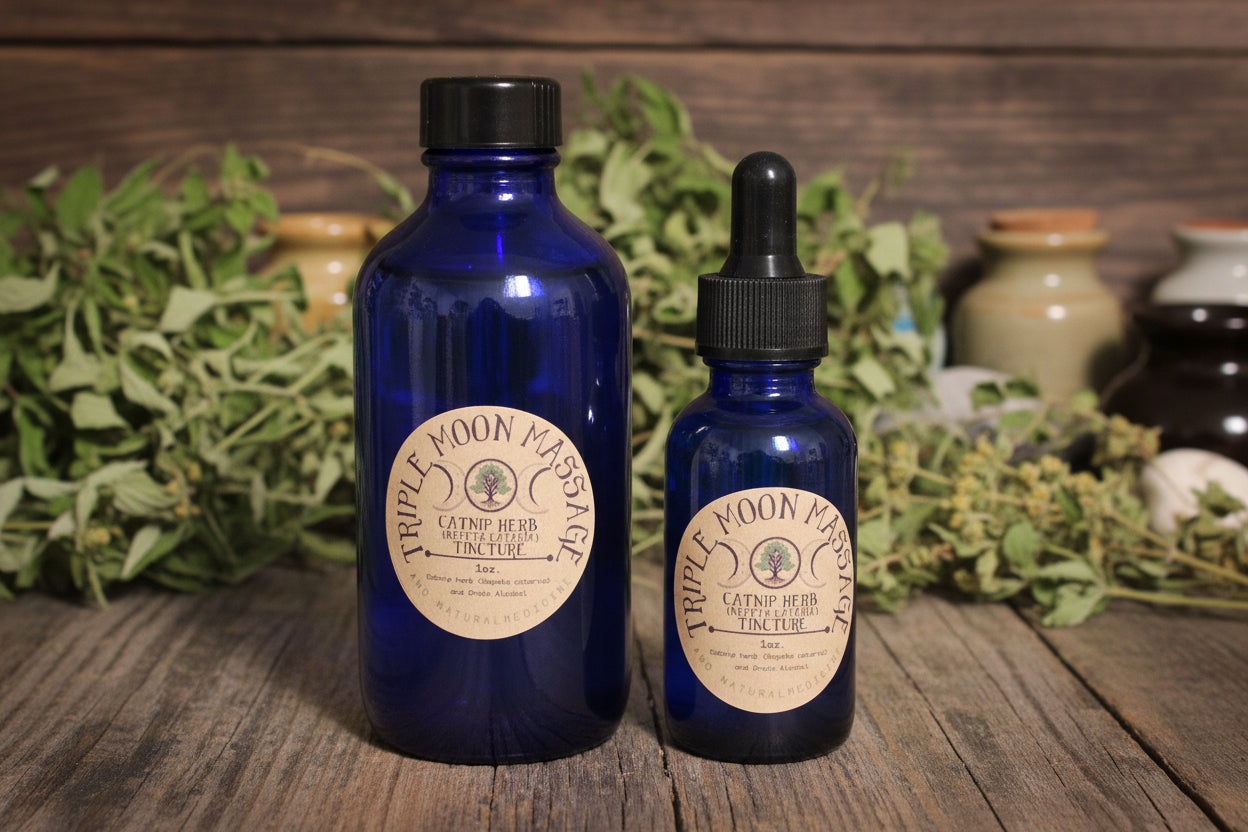 Two blue glass bottles with dropper and label on a green background