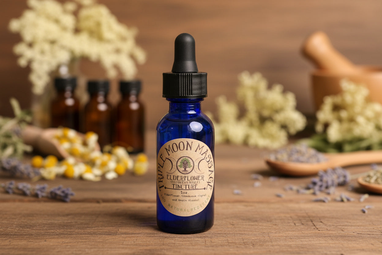 Bottle of Triple Moon Massage Elderflower Tincture with a label on a green background